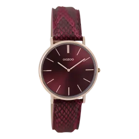 Rose gold coloured  watch with burgundy leather strap